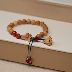 Elegant Peach Wood Lotus Pod Bracelet - Hand-Woven Plum Blossom Pattern for Spiritual Harmony & Protection