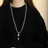 Elegant Men's Jade Sweater Chain with Plum Blossom Pendant for Vitality and Inner Peace