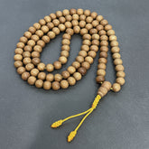 The Navigator's Cord: 108 Sandalwood Beads on a Maritime-Inspired Journey