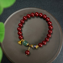 Cinnabar Ethnic Pendant Bracelet - Red & Green Bead Accents for Wealth Attraction & Blood Purification