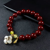 Cinnabar Bracelet with Four-Leaf Flower for Luck, Protection, and Positive Energy
