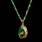 Elegant Peacock Pendant: Vintage Malachite Necklace for Prosperity & Spiritual Harmony
