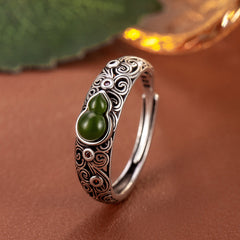 Vintage-Inspired Adjustable Openwork Ring - Enhance Harmony with Greenish-Blue Faux Jade Floral Design