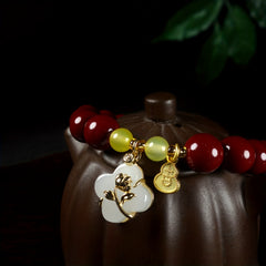 Exquisite Cinnabar Four-Leaf Flower Bracelet — Vitality, Harmony & Good Fortune Energy Jewelry