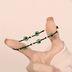 Niche Design Foot Chain - Hand-Woven Leg Rope with Green Jade Flower & Gold Accents for Elegant Ankle Style