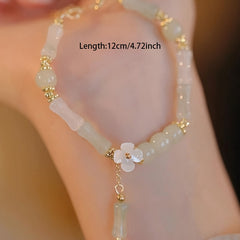 Vintage White & Golden Lotus Charm Bracelet - Faux Jade Beaded Jewelry for Mindful Living & Casual Elegance