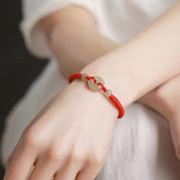 Elegant Hand Chain - Red Cord & Jade Bead for Symbolic Unity Energy