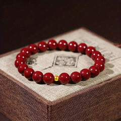1pc Elegant Cinnabar Bead Bracelet with Golden Accent – Unisex Red Jasper Protection Amulet, Smooth Polished Beads for Casual Attire or Gift Giving