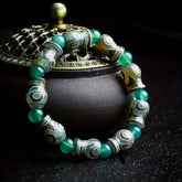 Green Agate Three-Eyed Dzi Amulet Bracelet – Prosperity, Protection & Spiritual Harmony
