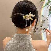 Tassel Habohemian ethnic design, mind-body-spirit balance, golden metal design, white pearl accents, green leaf motifs, imitation pearls, detailed craftsmanship, weddings and formal events, sirpin - Bohemian Ethnic Design for Mind-Body-Spirit Balance