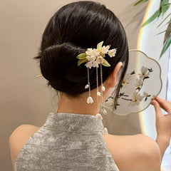 Tassel Habohemian ethnic design, mind-body-spirit balance, golden metal design, white pearl accents, green leaf motifs, imitation pearls, detailed craftsmanship, weddings and formal events, sirpin - Bohemian Ethnic Design for Mind-Body-Spirit Balance