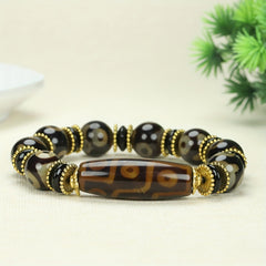 Three-Eyed Dzi Agate Bracelet for Spiritual Protection, Grounding, and Prosperity