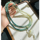 108-Bead Gradient Green–White Bodhi Root Mala — Lotus Charm for Mindful Harmony, Spiritual Balance & Grounding Energy