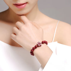 Natural Jet Bead Bracelet Golden Floral Charm December Birthstone Prosperity Energy Heartfelt Gift