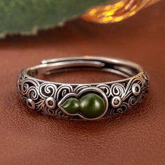 Vintage-Inspired Adjustable Openwork Ring - Enhance Harmony with Greenish-Blue Faux Jade Floral Design