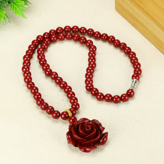 Cinnabar Rose Pendant Necklace - Red Crystal Jewelry for Passion & Protection