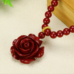 Cinnabar Rose Pendant Necklace - Red Crystal Jewelry for Passion & Protection