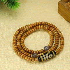 Tibetan Two-Eyed Dzi Bead Bracelet for Protection, Balance & Spiritual Insight