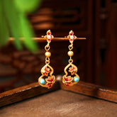 Golden-Plated Floral Gourd Earrings for Festive Energy Balance