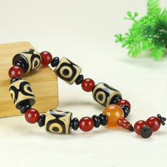 Three-Eyed Dzi Bead Bracelet for Spiritual Protection, Inner Peace, and Energetic Balance