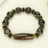 Three-Eyed Dzi Agate Bracelet for Spiritual Protection, Grounding, and Prosperity