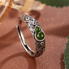 Vintage-Inspired Adjustable Openwork Ring - Enhance Harmony with Greenish-Blue Faux Jade Floral Design