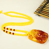 Elegant Vintage-Style Amber Character Pendant Necklace Handcrafted with Warmth & Spiritual Grounding for Meditation & Sweater Chains