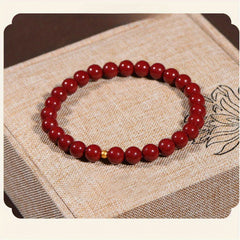 1pc Elegant Cinnabar Bead Bracelet with Golden Accent – Unisex Red Jasper Protection Amulet, Smooth Polished Beads for Casual Attire or Gift Giving