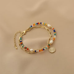 Bohemian Golden-Tone Beaded Bracelet — Joy & Creativity Enhancer with Daisy Charm