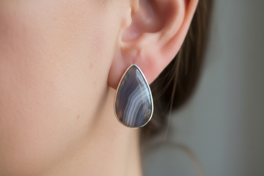 The Cool Weight of Remembering: Skin Against Polished Agate and Sterling Silver