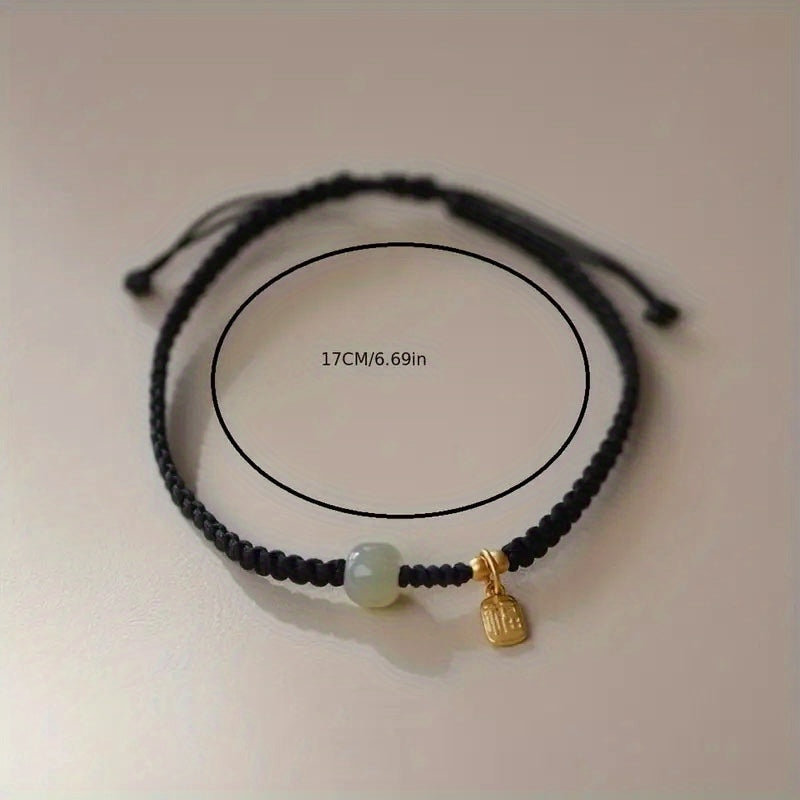 Red & Black Braided Rope Lucky Bracelet — Jade Energy Bead, Golden Charm, Protection & Harmony Wristband
