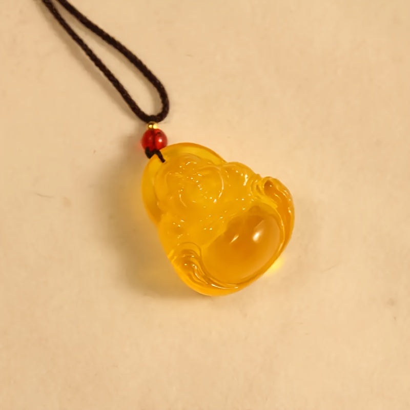 Golden Buddha Amber Necklace for Prosperity, Protection, and Spiritual Peace