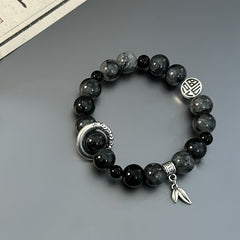 1 Stylish Glass Bead Stretch Bracelet with Pendant - Unisex Black & Gold Design for Casual Wear & Energy Balance