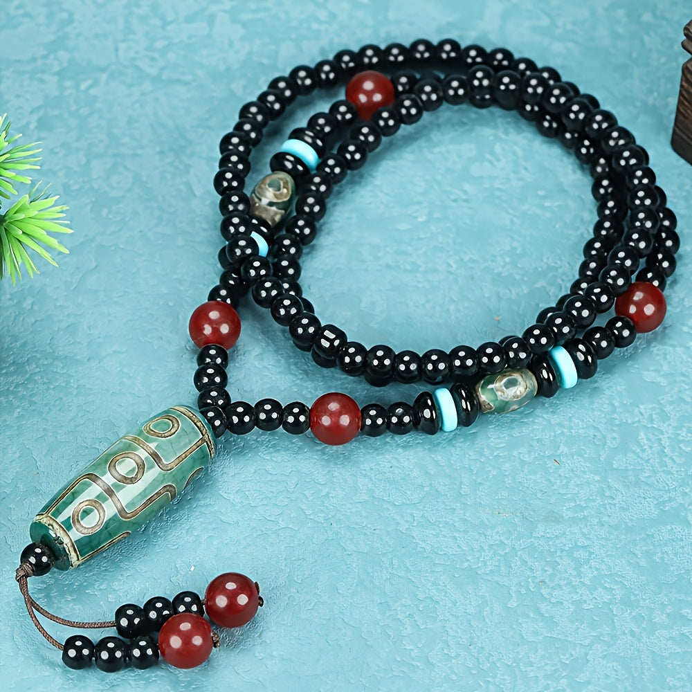 Tibetan Black Agate Necklace with Green Dzi Bead for Protection, Wealth, and Spiritual Balance