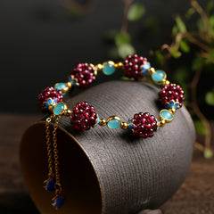 Natural Garnet Woven Ball Bracelet — Vitality & Passion Energy Charm with Hollow Fish Design