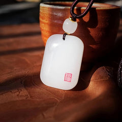 Elegant White Sheepskin Ziquexsite Charm - Peaceful Energy Enhancing Charm for Men