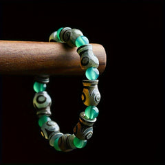 Green Agate Three-Eyed Dzi Amulet Bracelet – Prosperity, Protection & Spiritual Harmony