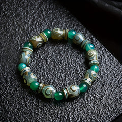 Green Agate Three-Eyed Dzi Amulet Bracelet – Prosperity, Protection & Spiritual Harmony