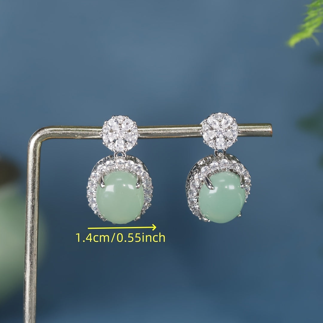 Earrings being worn subtly, partially hidden by hair