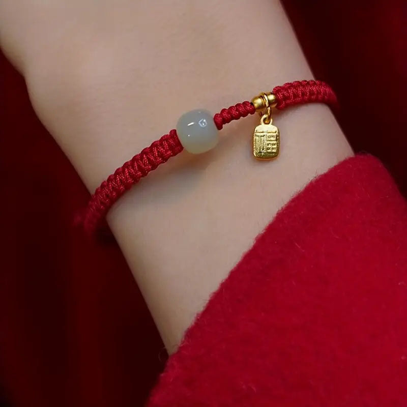 Red & Black Braided Rope Lucky Bracelet — Jade Energy Bead, Golden Charm, Protection & Harmony Wristband