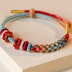 Lucky Peach Blossom Knot Bracelet - Hand-Woven Adjustable Red String with Golden Beads for Love & Good Fortune