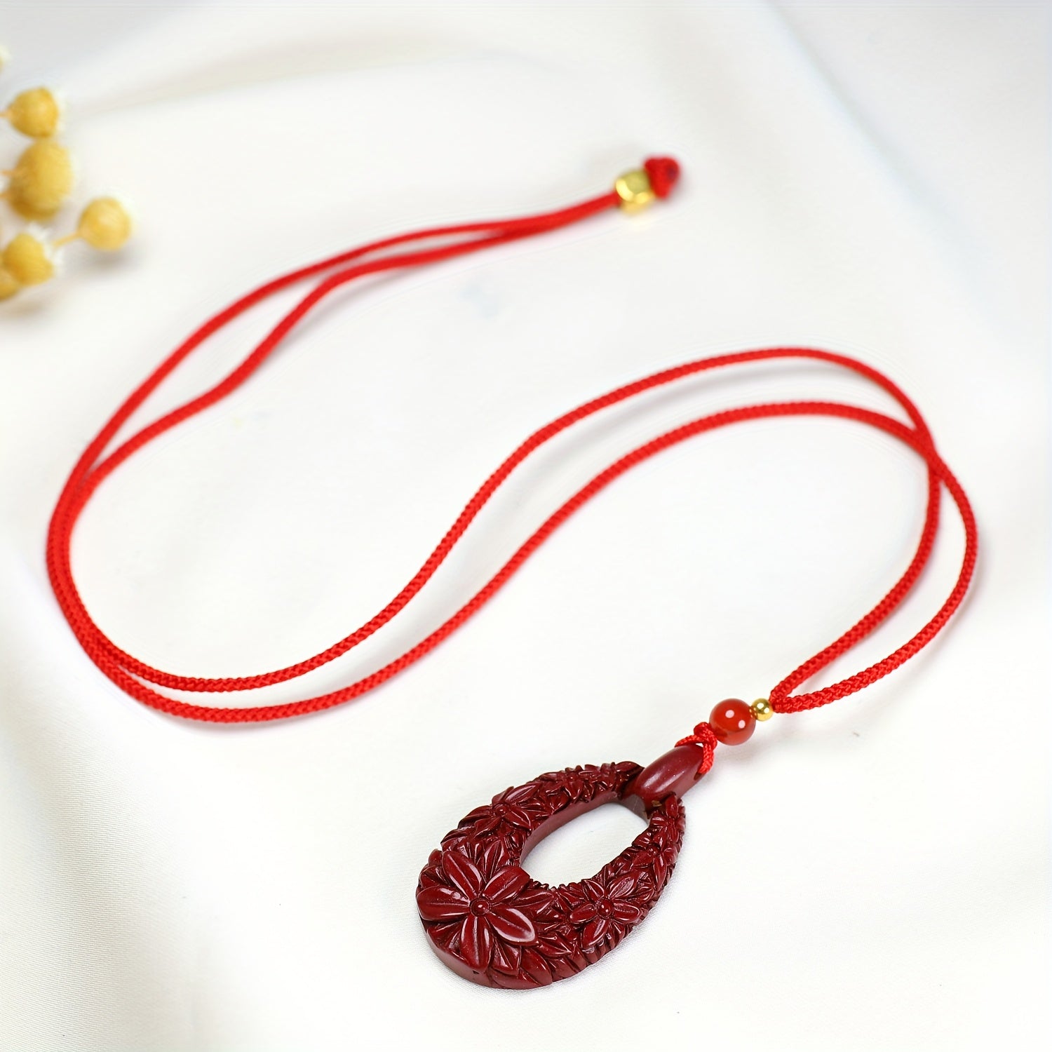 Pendant being worn in various lifestyle contexts