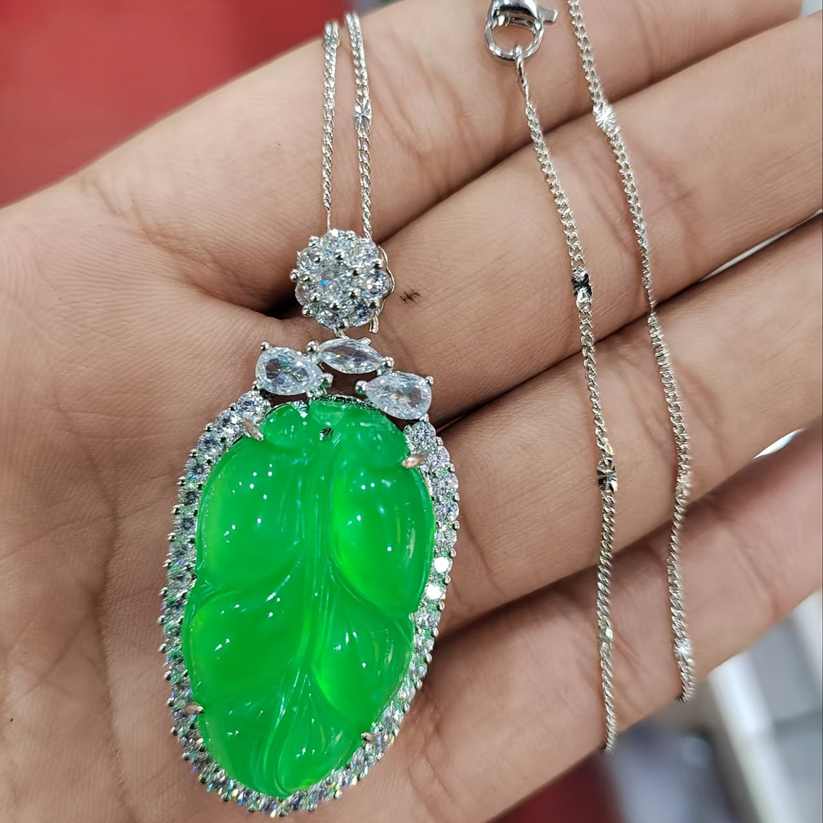 Elegant Green Jade Leaf Pendant for Prosperity, Emotional Balance, and Timeless Style