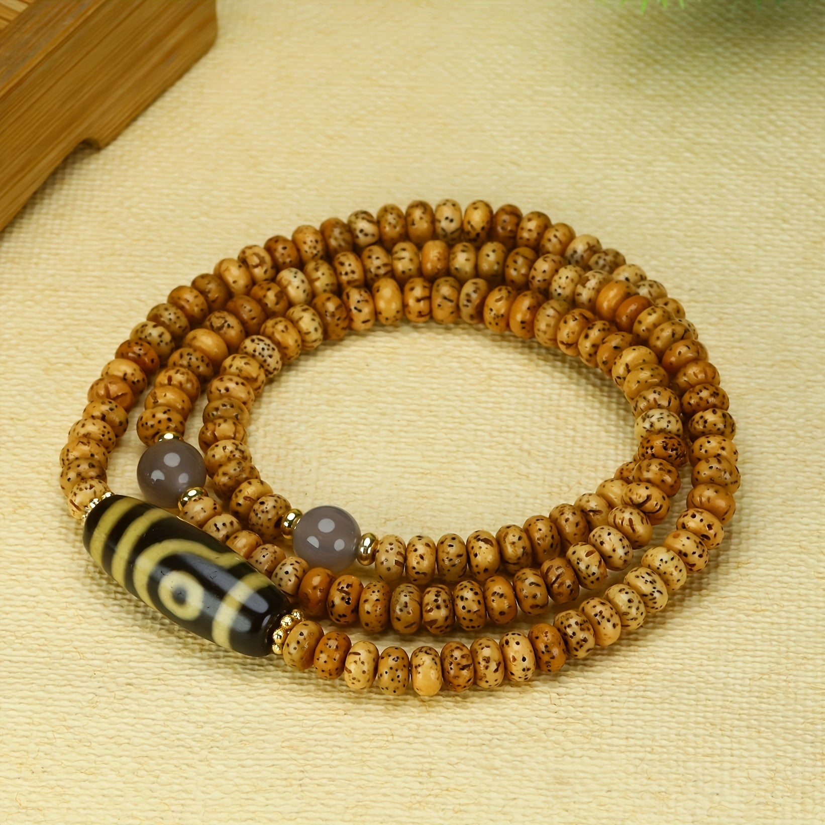 Tibetan Two-Eyed Dzi Bead Bracelet for Protection, Balance & Spiritual Insight