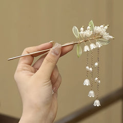 Tassel Habohemian ethnic design, mind-body-spirit balance, golden metal design, white pearl accents, green leaf motifs, imitation pearls, detailed craftsmanship, weddings and formal events, sirpin - Bohemian Ethnic Design for Mind-Body-Spirit Balance