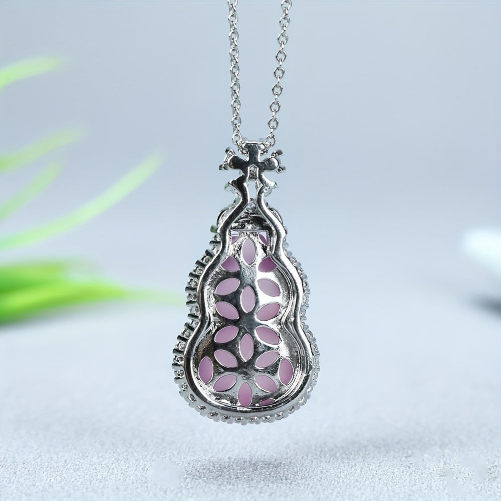 Close-up view showing the natural banding and polish of the pink agate