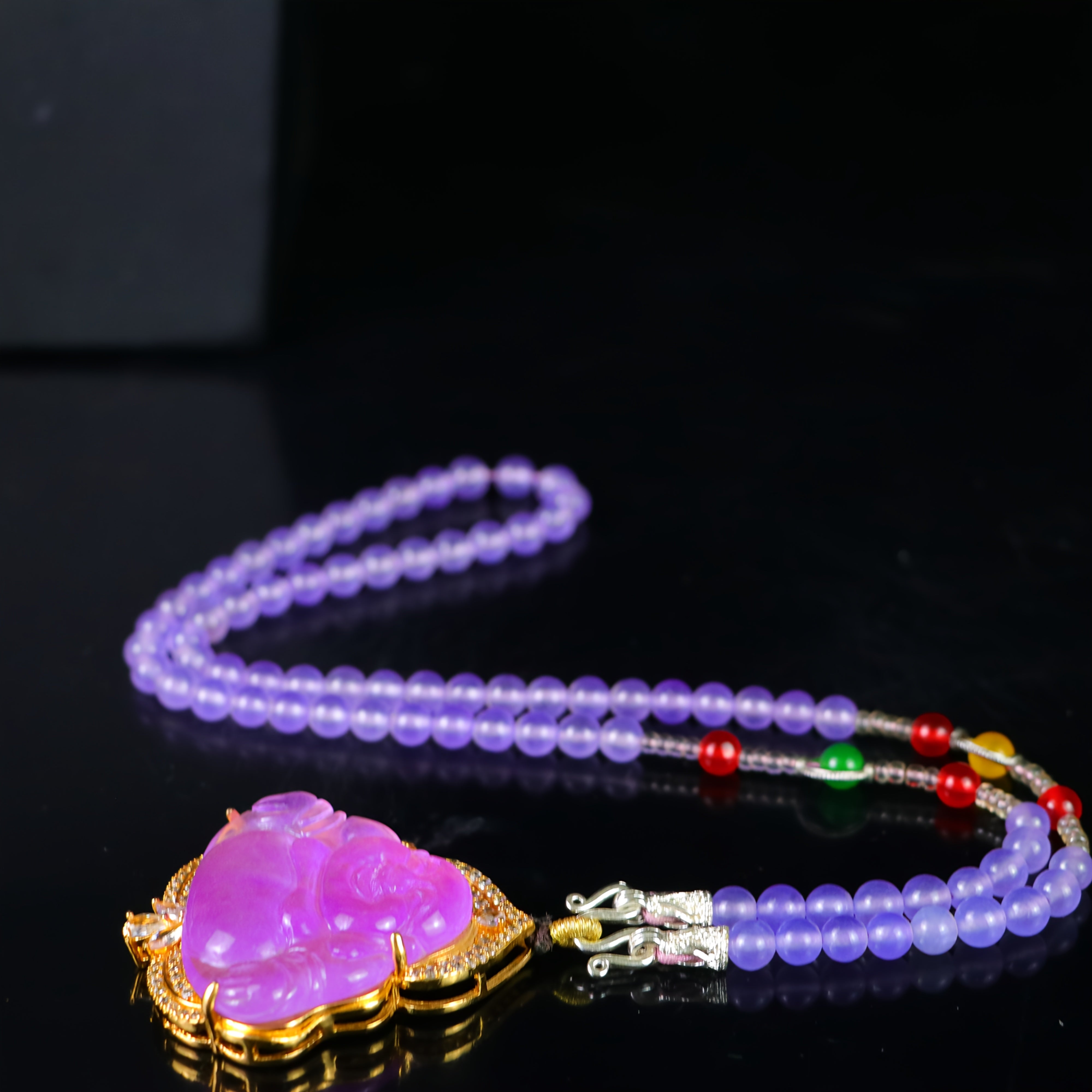 Elegant Vintage Violet Character Earrings showcasing intricate carving and natural stone beauty