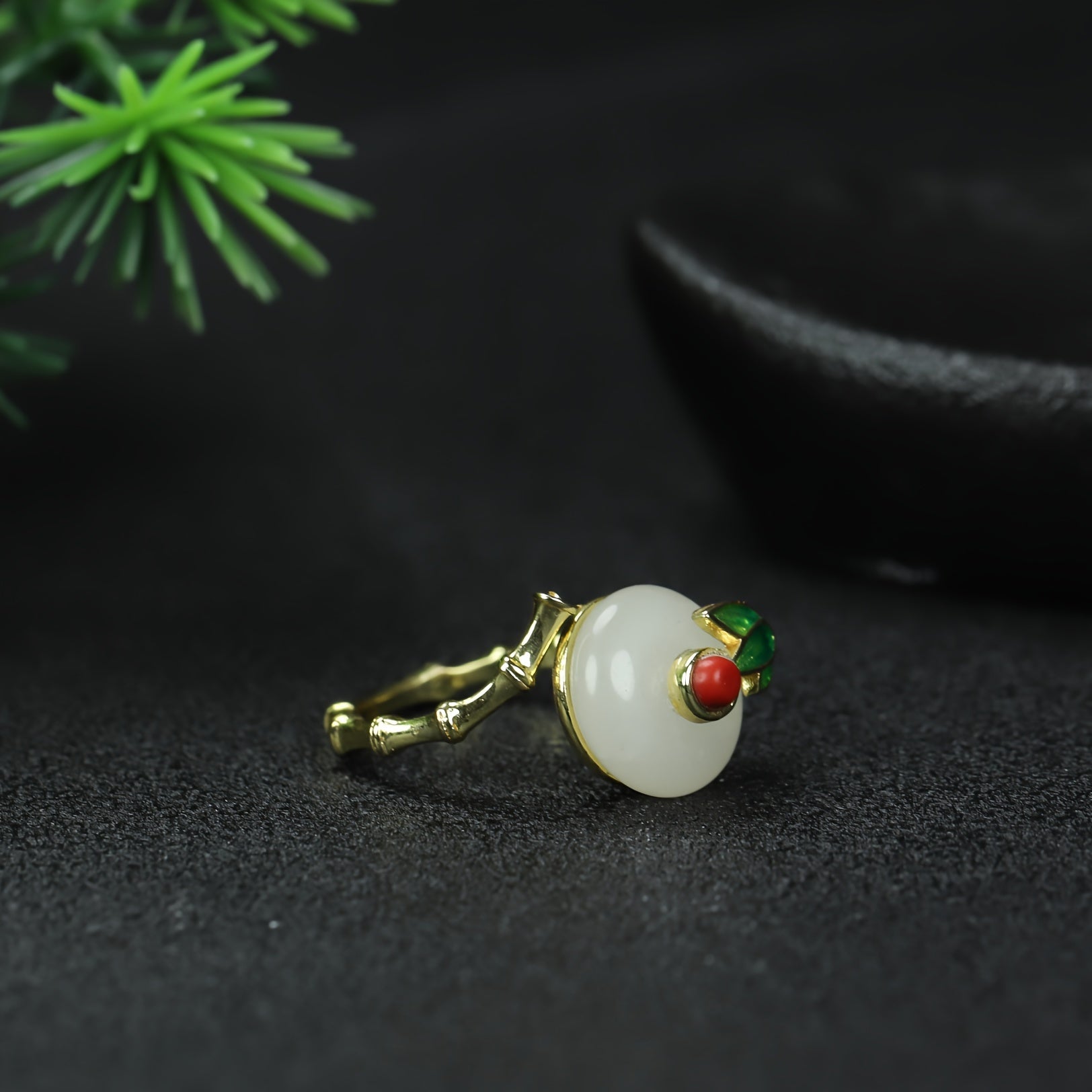 A diagram showing the energy benefits of the jade ring, connecting to chakras.