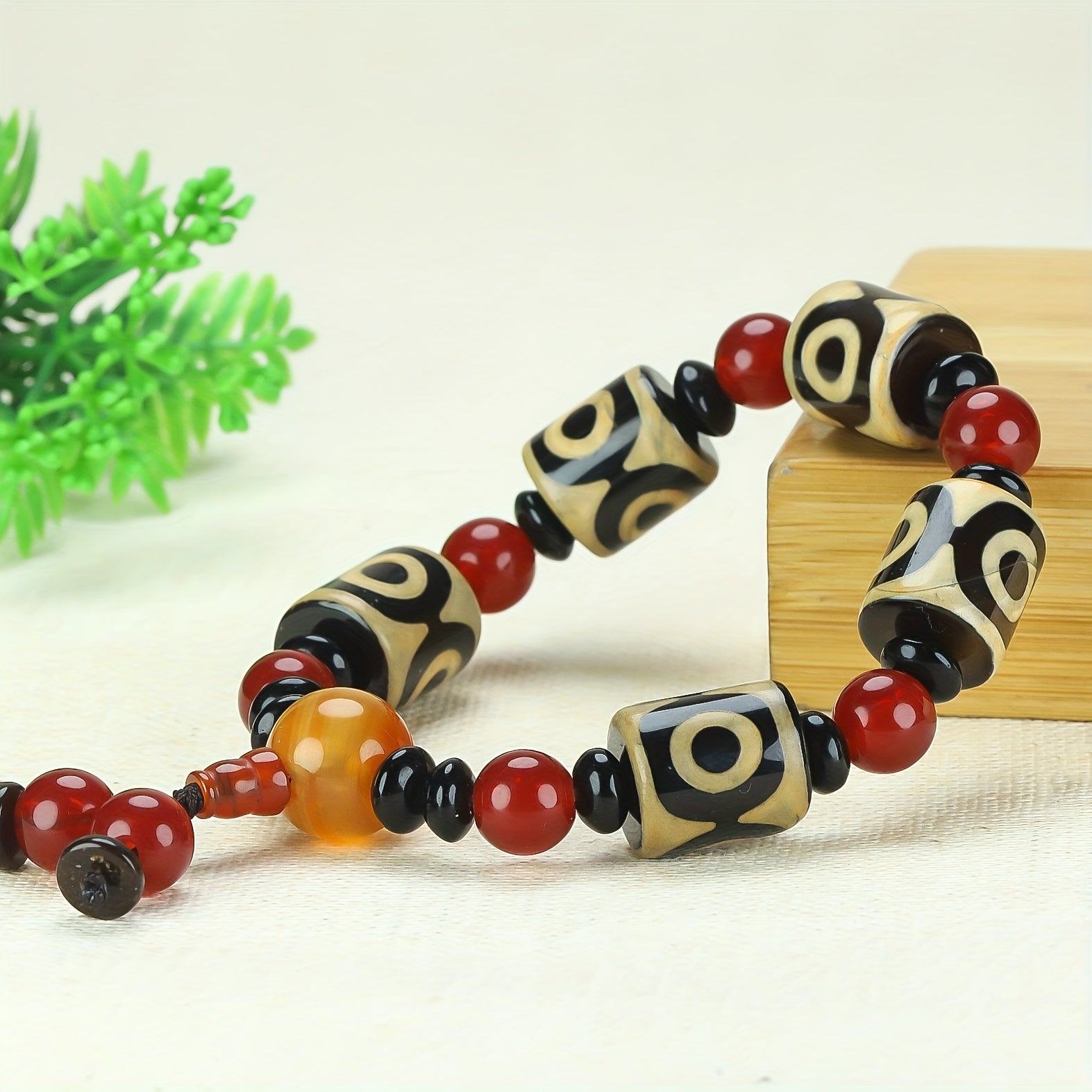 Three-Eyed Dzi Bead Bracelet for Spiritual Protection, Inner Peace, and Energetic Balance