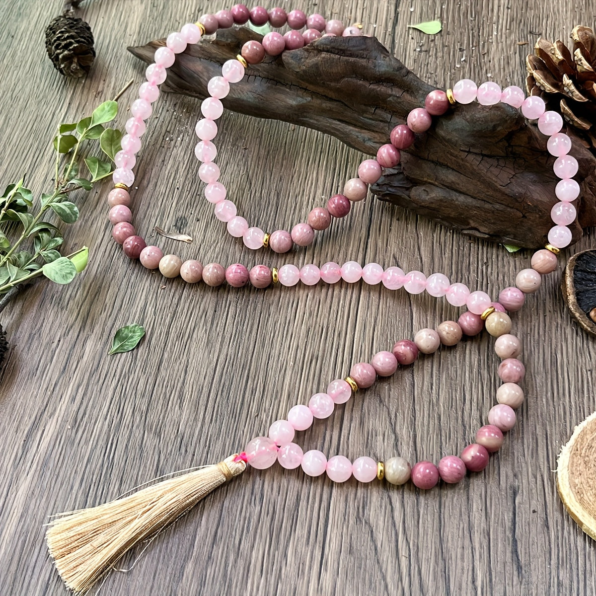 Multiple mala necklaces styled together